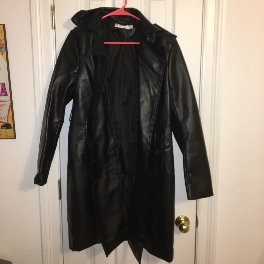 Black faux-leather coat.